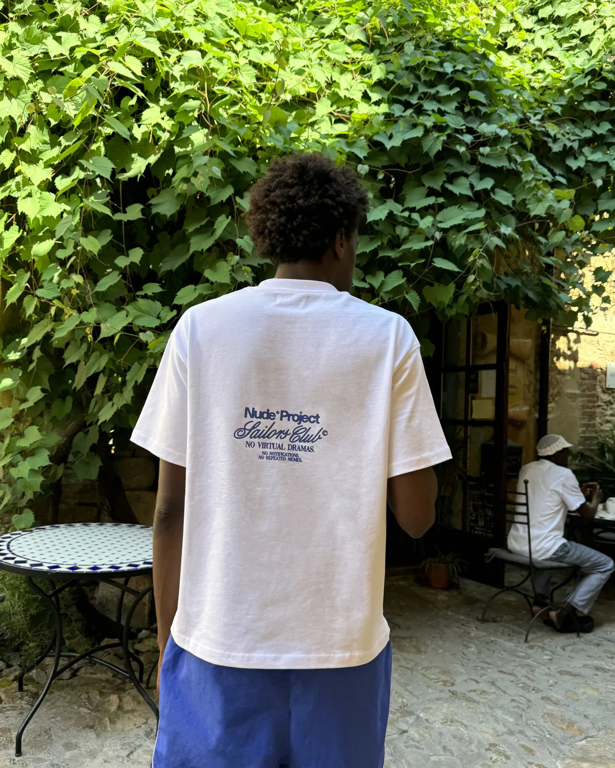 Camiseta Flag Blanca – Nude Project